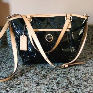 Shiny black Coach purse